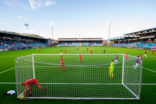 Kristoffer Barmen and goalkeeper Håkon Opdal of Brann look