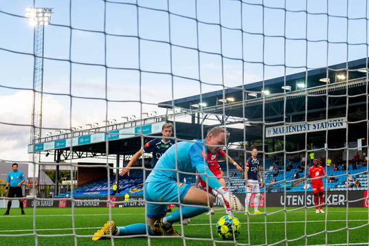 Goalkeeper Viljar Myhra of Strømsgodset makes a save