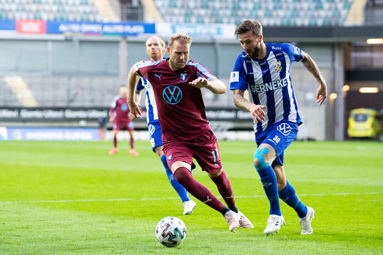 Malmö FFs Ola Toivonen och IFK Göteborgs Mattias Bjärsmyr