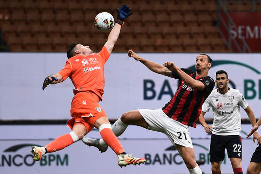 Goalkeeper Alessio Cragno of Cagliari and Zlatan Ibrahimovic