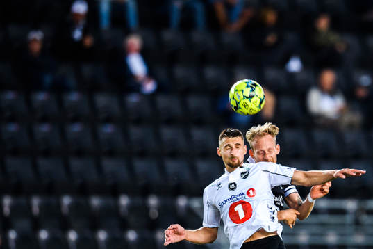 Elbasan Rashani of Odd and Gjermund Åsen of Rosenborg