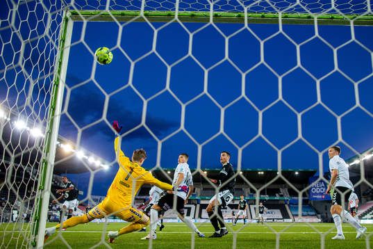 Emil Ceide of Rosenborg hits the crossbar behind goalkeeper