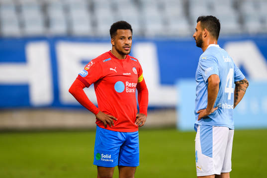 Helsingborgs Martin Olsson och Malmö FFs Behrang Safari