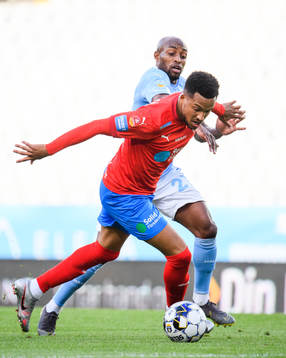 Helsingborgs Martin Olsson och Malmö FFs Fouad Bachirou