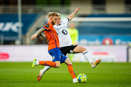 Fredrik Kjernmoen Carlsen of Aalesund and Edvard Sandvik