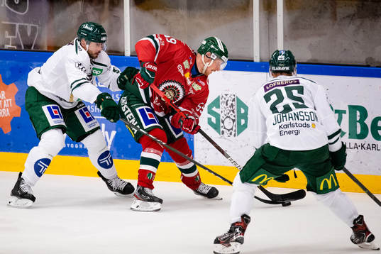 Färjestads Jens Westin och Martin Johansson mot Frölundas