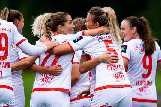Ingrid Ryland and Ingrid Stenevik of Sandviken celebrate