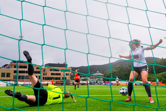 Goalkeeper Kristin Rage and Ingrid Bergland of Amazon