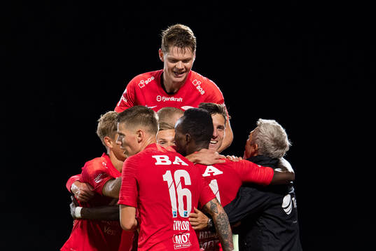 Christian Rismark of Brann celebrates with teammates