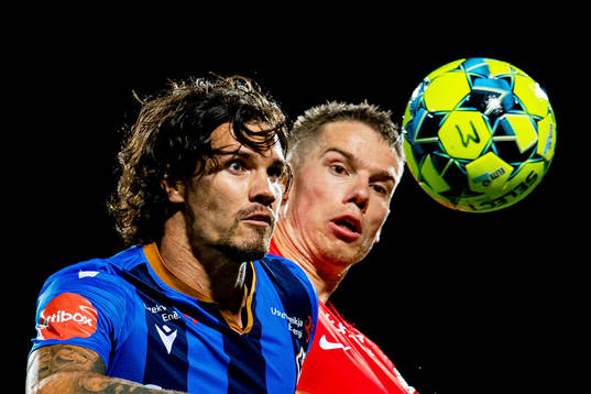 Jørgen Olsen Øveraas of Stabæk and Robert Taylor of Brann