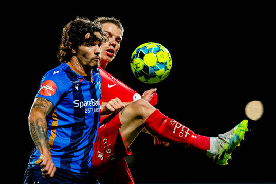Jørgen Olsen Øveraas of Stabæk and Robert Taylor of Brann