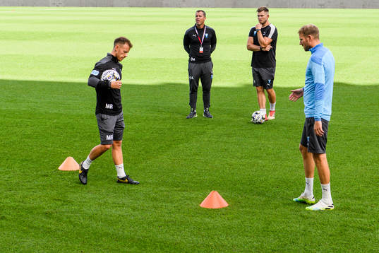 Ola Toivonen with Mark Read, physical trainer and Daniel
