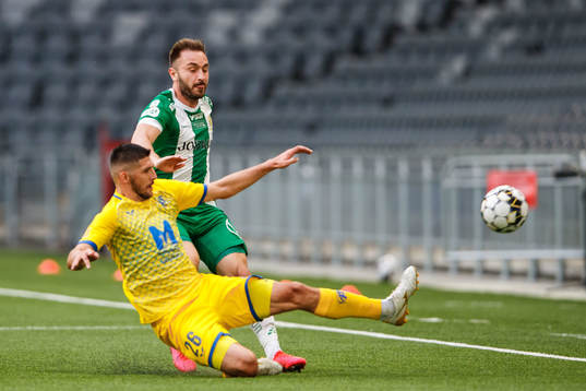 Marton Radics of Puskas and Muamer Tankovic of Hammarby