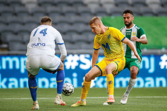 Csaba Spandler of Puskas and Imad Khalili of Hammarby