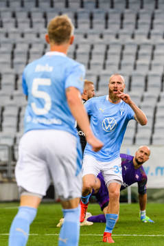 Jo Inge Berget celebrates with Sören Rieks of Malmö FF