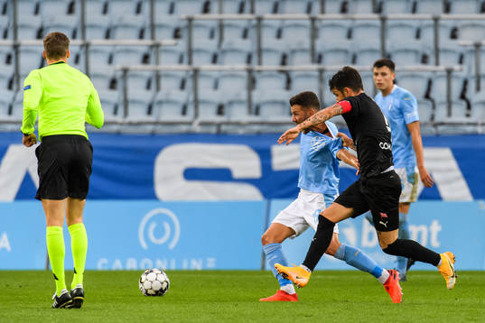 Sergiu Hanca of Cracovia and Erdal Rakip of Malmö FF