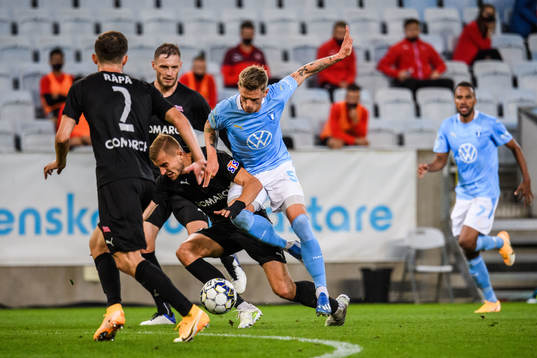 Sören Rieks of Malmö FF and Michal Helik of Cracovia