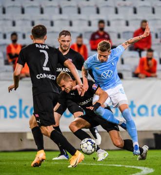 Sören Rieks of Malmö FF and Michal Helik of Cracovia