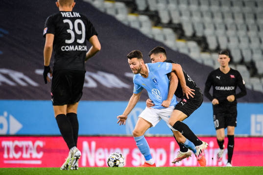 Erdal Rakip of Malmö FF and Florian Loshaj of Cracovia