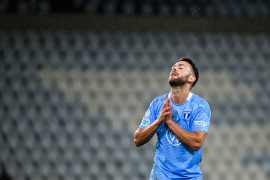 Erdal Rakip of Malmö FF looks dejected