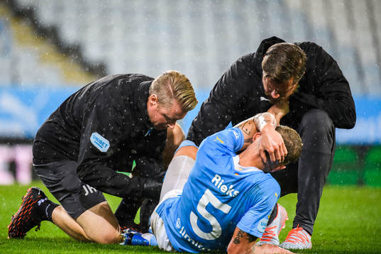 Sören Rieks of Malmö FF receives medical treatment from