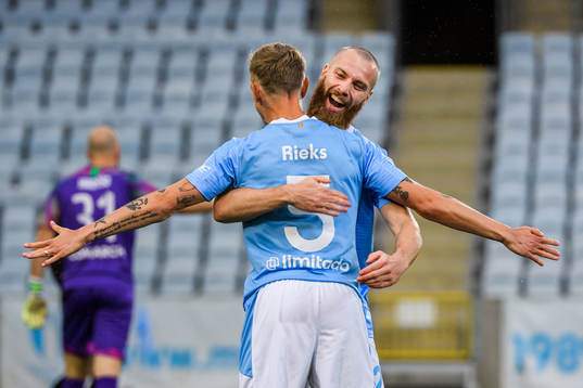 Jo Inge Berget celebrate with Sören Rieks of Malmö FF