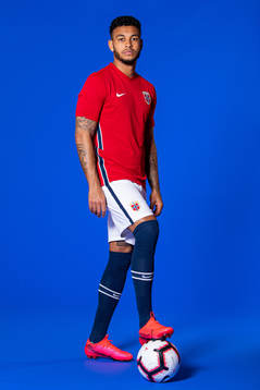 Joshua King of the Norwegian national football team poses