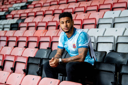 Joshua King of the Norwegian national football team poses