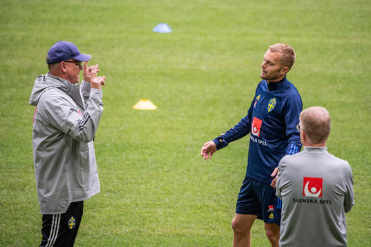 Janne Andersson, head coach, and Sebastian Larsson of the