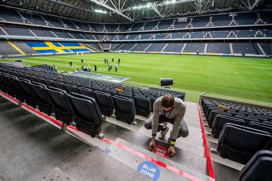 Staff are marking out zones where people are allowed