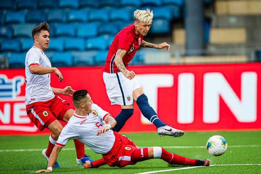 Birk Risa of Norway scores the 2-0 goal