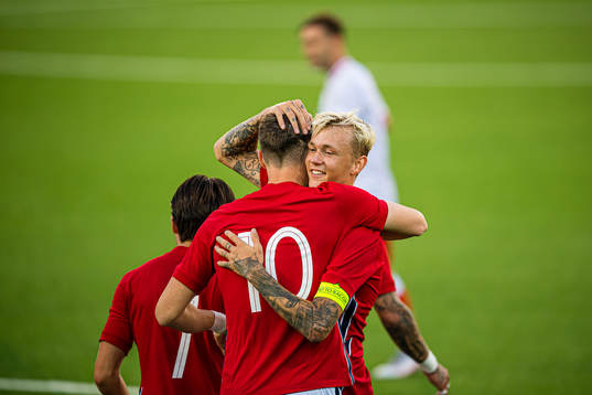 Jørgen Strand Larsen of Norway celebrates with Birk Risa