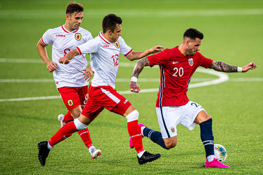 Kieron Garcia of Gibraltar and Aron Dønnum of Norway