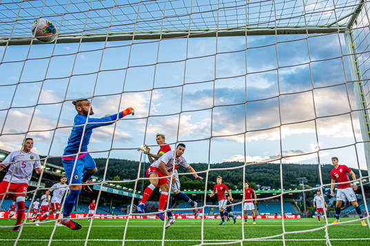 Birk Risa of Norway scores the 4-0 goal