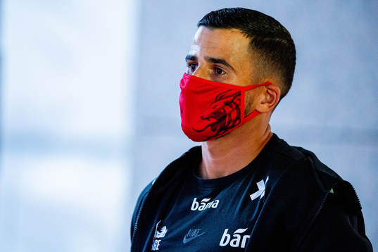 Omar Elabdellaoui of Norway arrives wearing a face mask