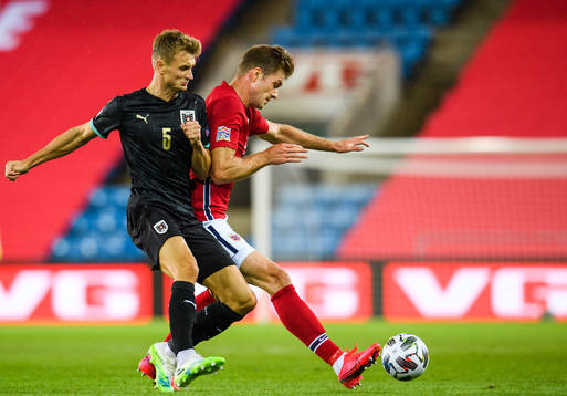 Stefan Posch of Austria and Alexander Sørloth of Norway