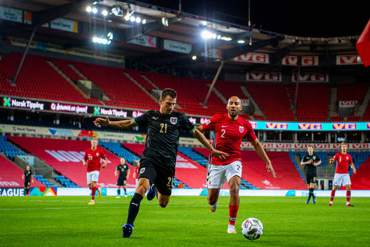 Stefan Lainer of Austria and Haitam Aleesami of Norway