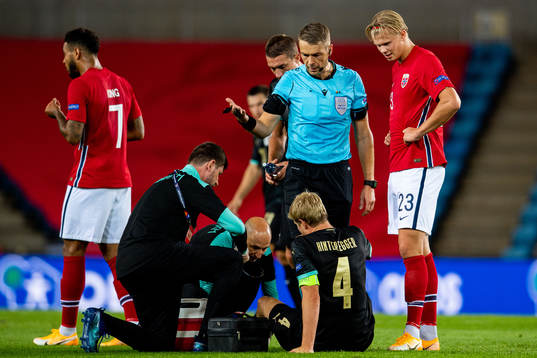 Martin Hinteregger of Austria, referee Mattias Gestranius