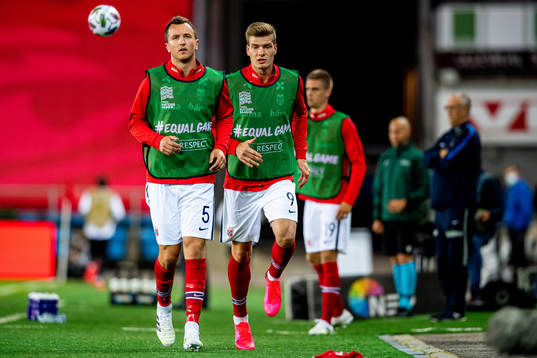 Even Hovland and Alexander Sørloth of Norway warm up