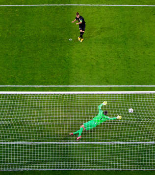 Marcel Sabitzer of Austria scores the 0-2 goal with a