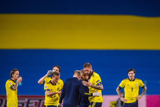 Pontus Jansson of Sweden receives medical attention
