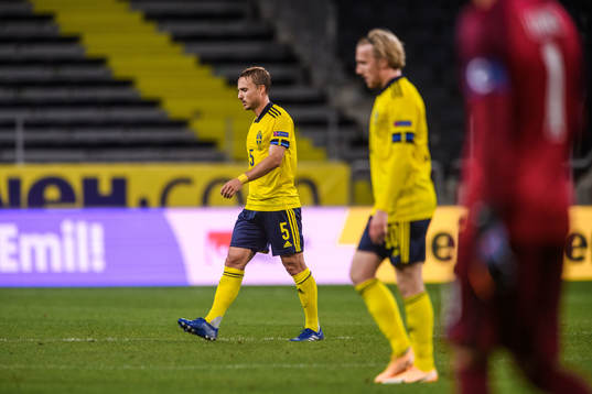 Pierre Bengtsson and Emil Forsberg of Sweden looks dejected