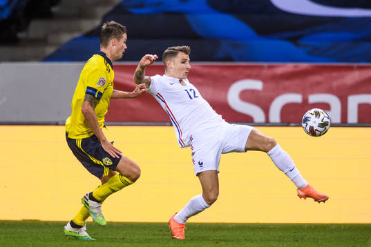 Mikael Lustig of Sweden and Lucas Digne of France