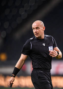 Referee Szymon Marciniak