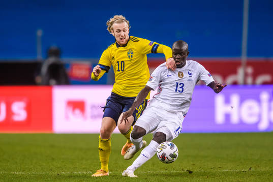 Emil Forsberg of Sweden and N'Golo Kanté of France