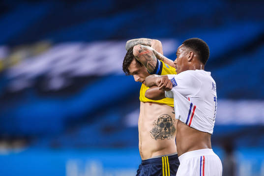 Victor Nilsson Lindelöf of Sweden and Anthony Martial of