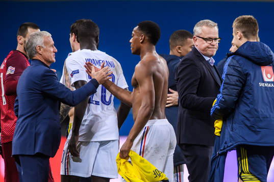 Head coach Didier Deschamps of France and head coach Janne