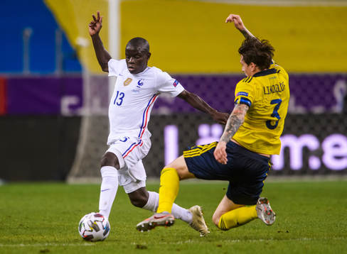 N'Golo Kanté of France and Victor Nilsson Lindelöf of