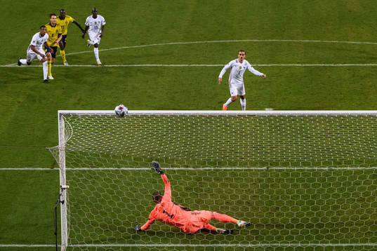 Antoine Griezmann of France misses a penalty behind