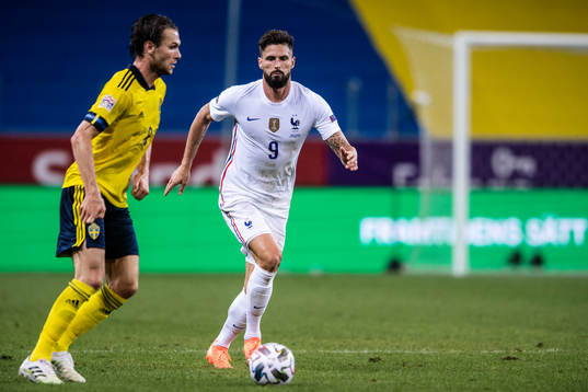 Albin Ekdal of Sweden and Olivier Giroud of France